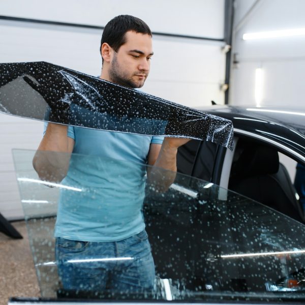 Specialist installs wetted car tinting, tuning